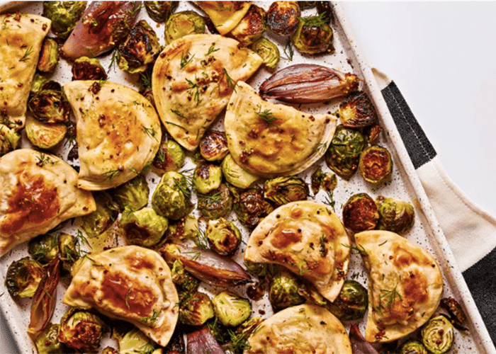 Sheet Pan Pierogies With Roasted Brussels Sprouts, Shallots, And Mustard Dressing