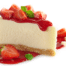 "Indulgent homemade cheesecake with creamy texture, topped with vibrant strawberries