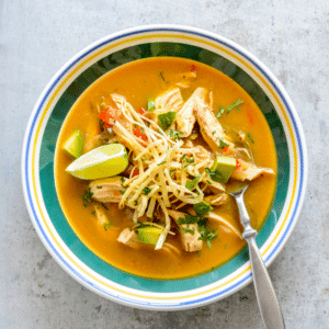 Bowl of homemade chicken tortilla soup with toppings Bowl of homemade chicken tortilla soup with toppings